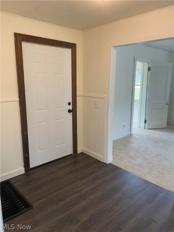 Entry with plank style flooring.