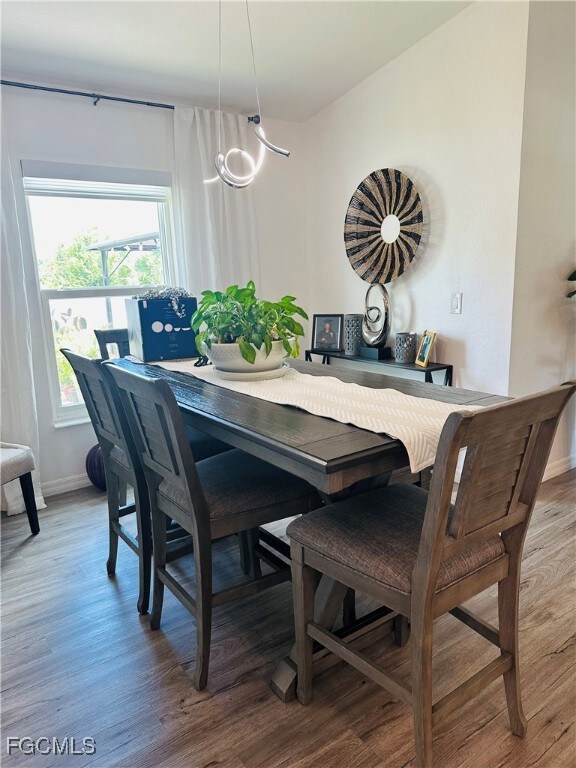 Dining space with light wood finished floors