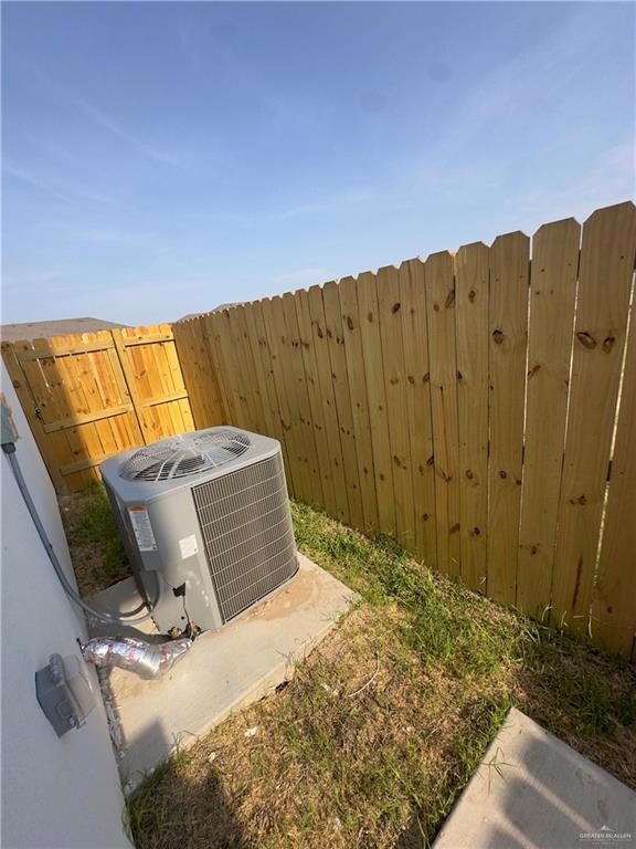 Exterior view of a gate and central AC