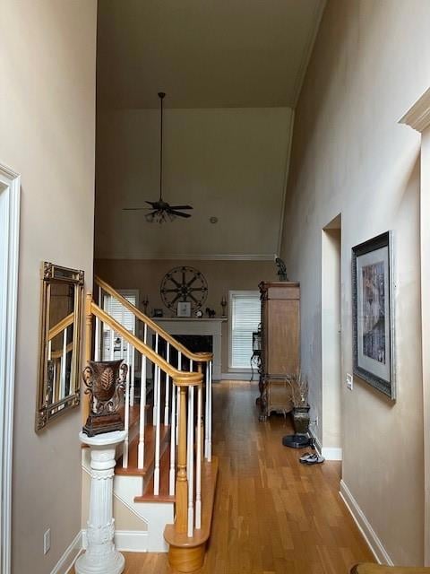 Staircase with ceiling fan, high vaulted ceiling, 