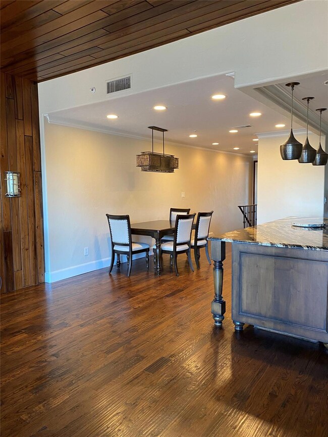 Open concept with decorative lighting, including a
