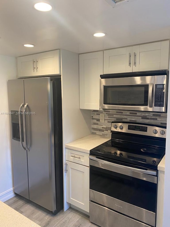 1089 N Benoist Farms Rd unit 107, West Palm Beach, FL 33411 - photo 7