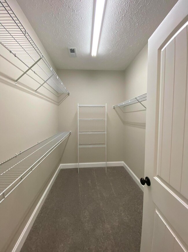 Primary walk-in closet