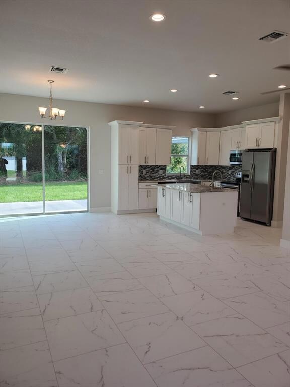 1282 SW Minyo Ave, Port Saint Lucie, FL 34953 - photo 2