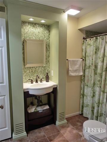 Remodeled full bath-new shower, linen storage, gla