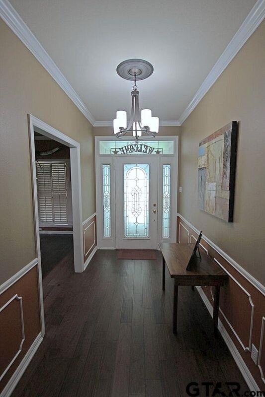 Gracious entry space is ideal for gorgeous rugs & 