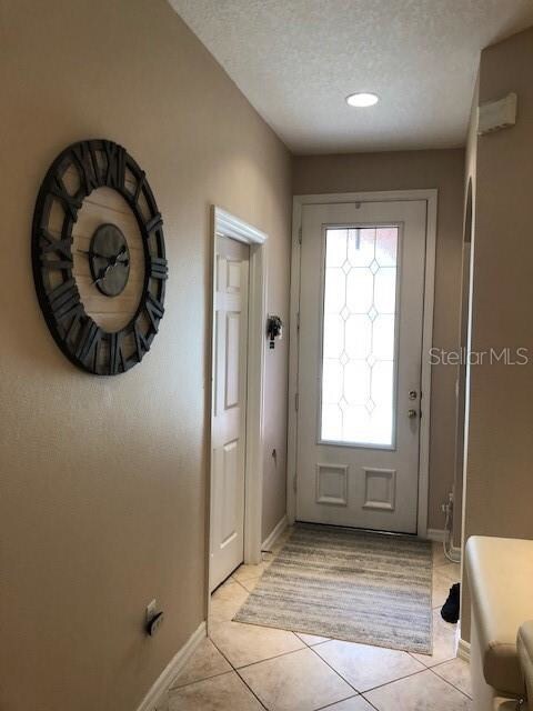 Foyer with beautiful stained glass door