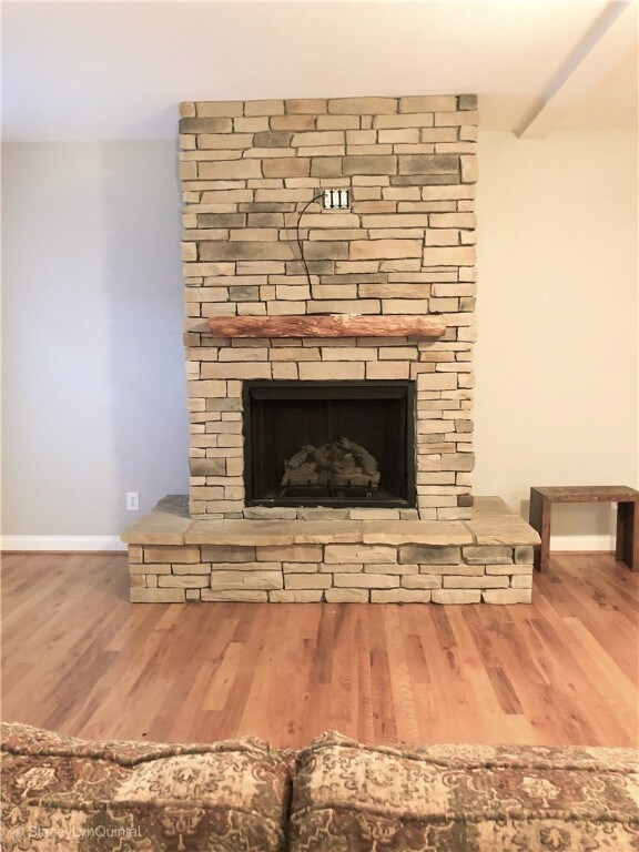 A stone fireplace for a chilly night