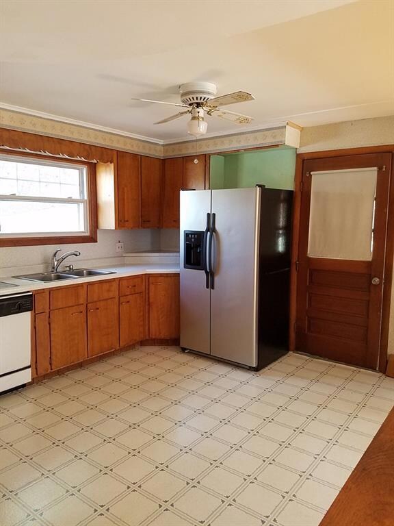 Kitchen with refrigerator