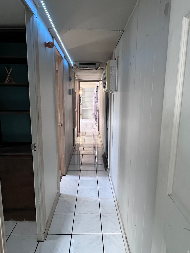 Hall with main wall unit AC