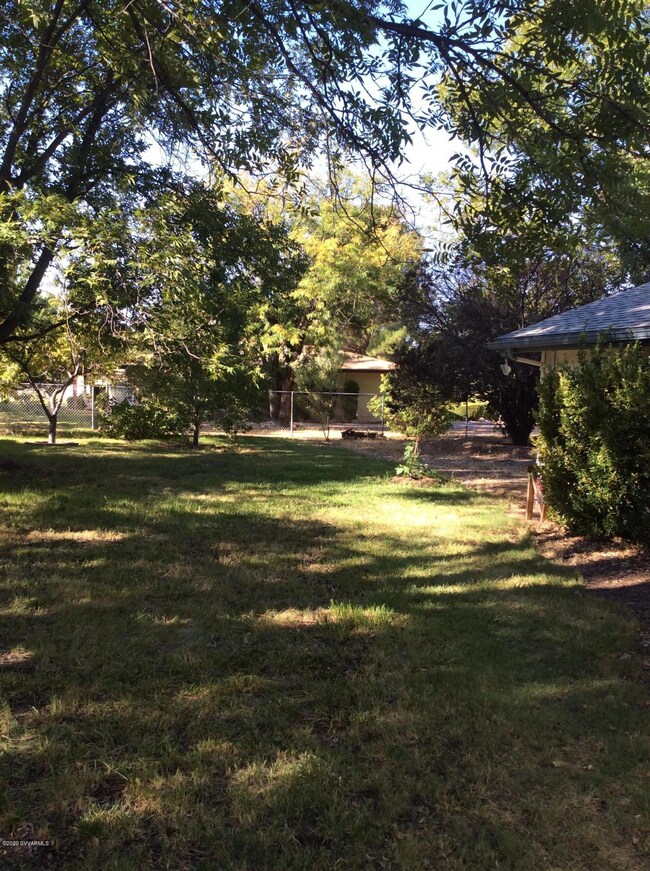 Completely fenced backyard