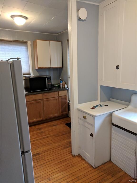 Left side apt, kitchen, before current tenant move