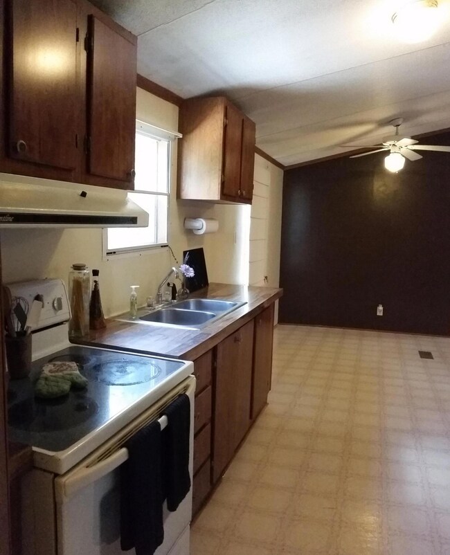 Kitchen looks out to back yard