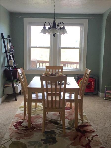 Dining Room is spacious and overlooks the deck.