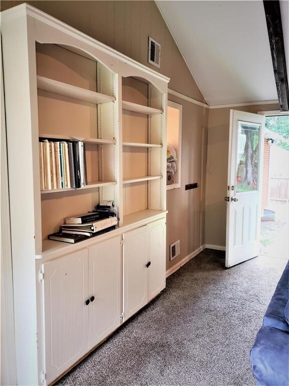GREAT ROOM BUILT-INS WITH LEVEL DOOR TO EXTERIOR B