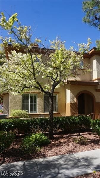View of property exterior featuring stucco siding