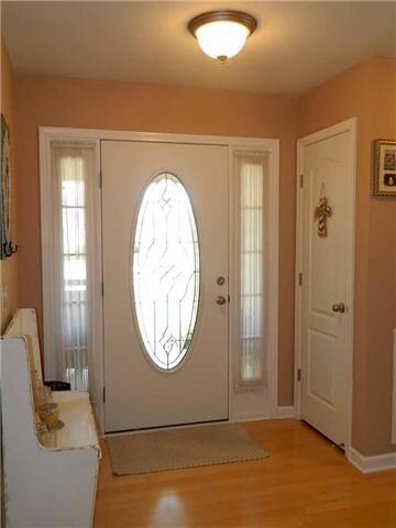 Entry Foyer—    Spacious Hardwood   Entry offers a large coat closet and opens to the Greatroom and accesses the hall leading to   bedrooms 2 & 3.  