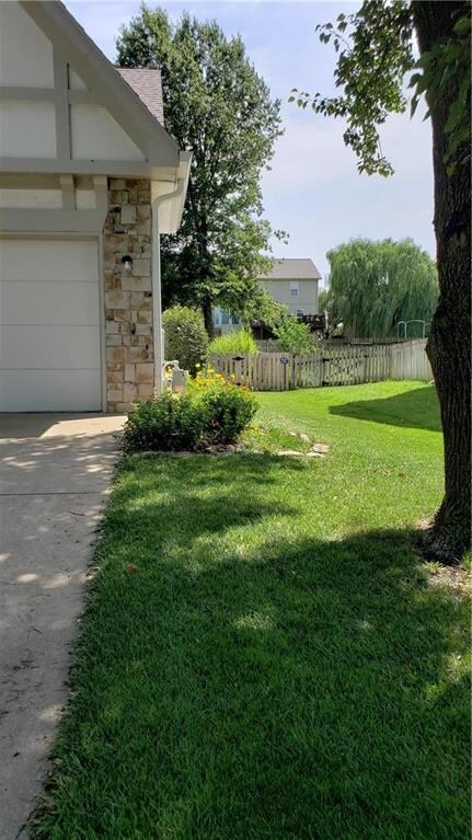 South view of the side yard. Yard is fully fenced.