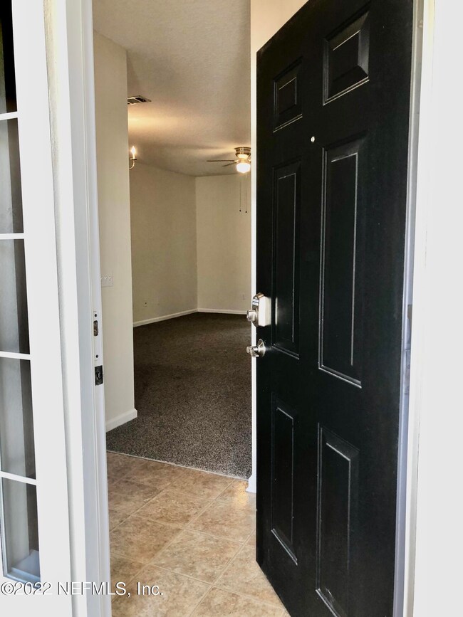 7887 Melvin Rd, Jacksonville, FL 32210 - photo 2