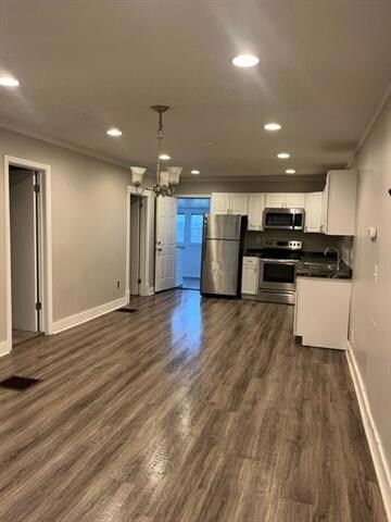 Recessed lighting and new stainless appliances.