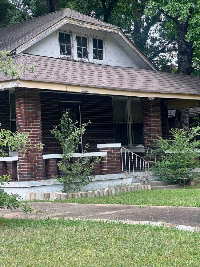 View of front of property featuring covered porch