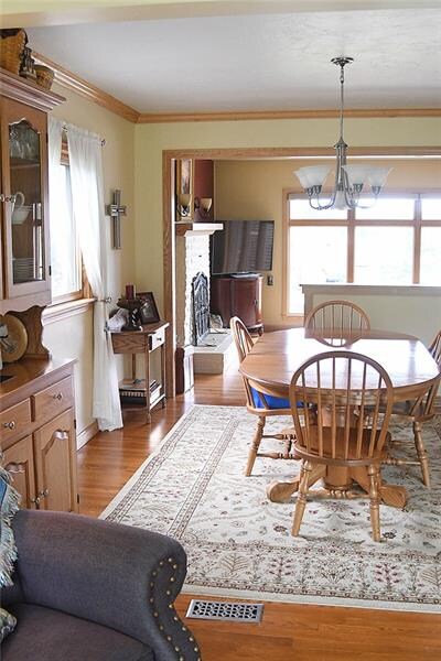 DINING ROOM HAS OPENED WALL FROM LIVING ROOM.