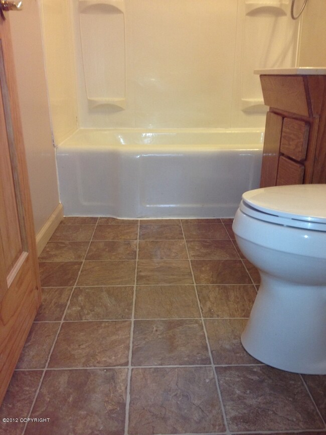 new flooring in upstairs bathroom
