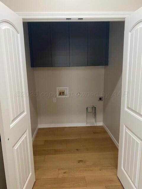 Laundry room with double doors