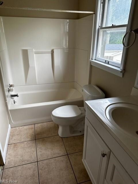 2nd Fl full bathroom with shower / tub combination, light tile floors, and vanity
