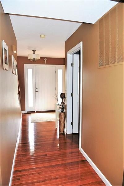Hallway. Enter the home and discover gleaming hard