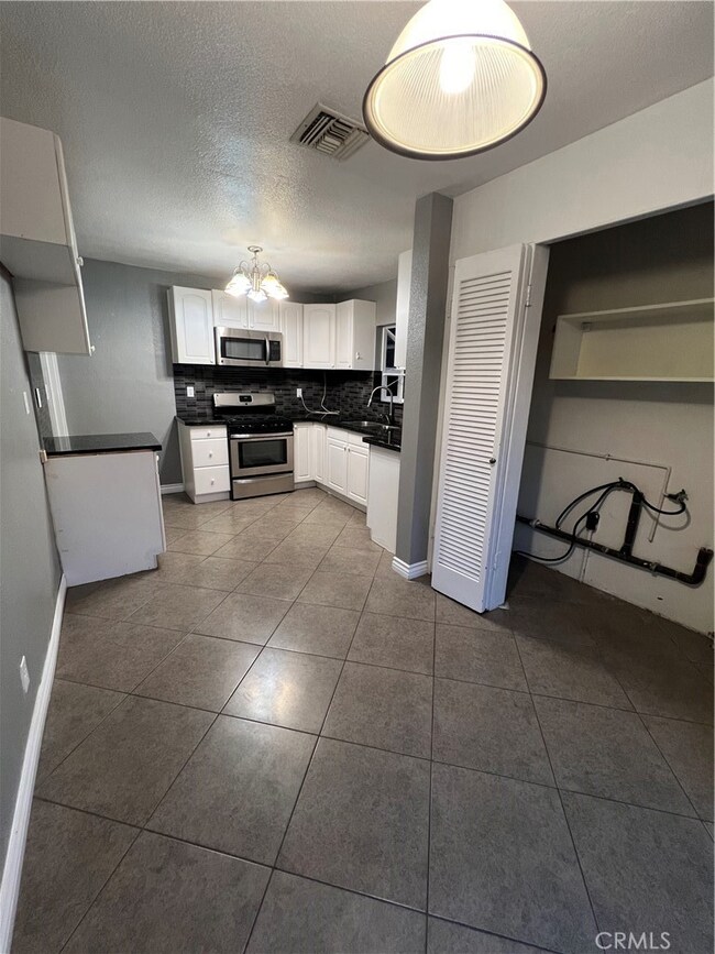 Laundry closet is located in the kitchen.