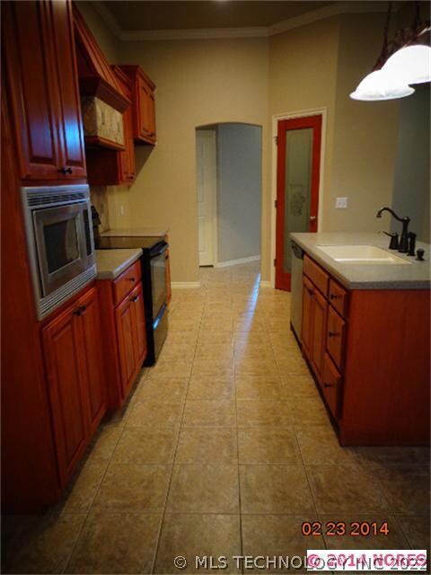 Large kitchen space with pantry.