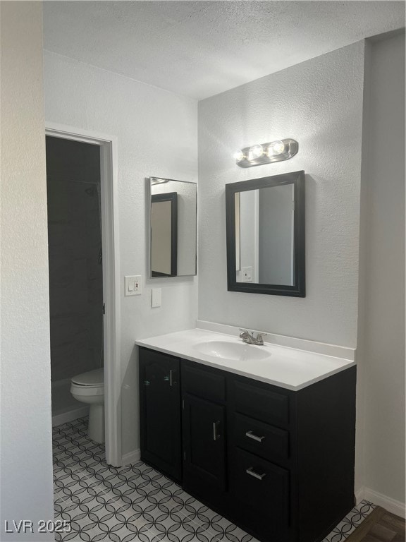 Bathroom featuring vanity, a textured wall, a tile shower, a textured ceiling, and light tile patterned floors