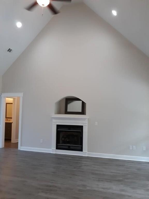 LIVING ROOM FEATURING 16' VAULTED CEILING
