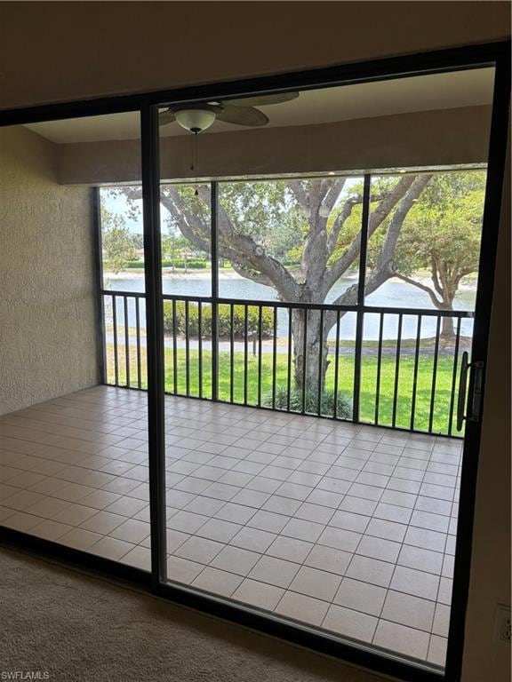 Unfurnished sunroom featuring a water view and healthy amount of natural light
