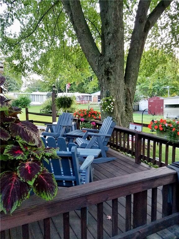 This gorgeous wrap around deck (with electric serv