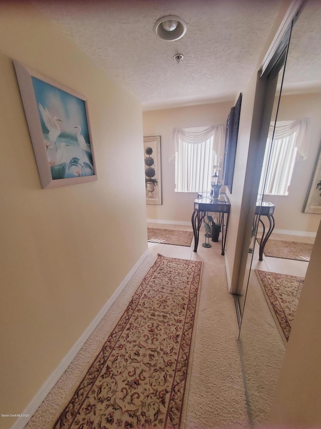 view to entry hall from living room