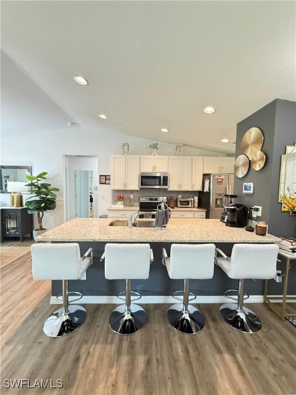 Kitchen featuring appliances with stainless steel