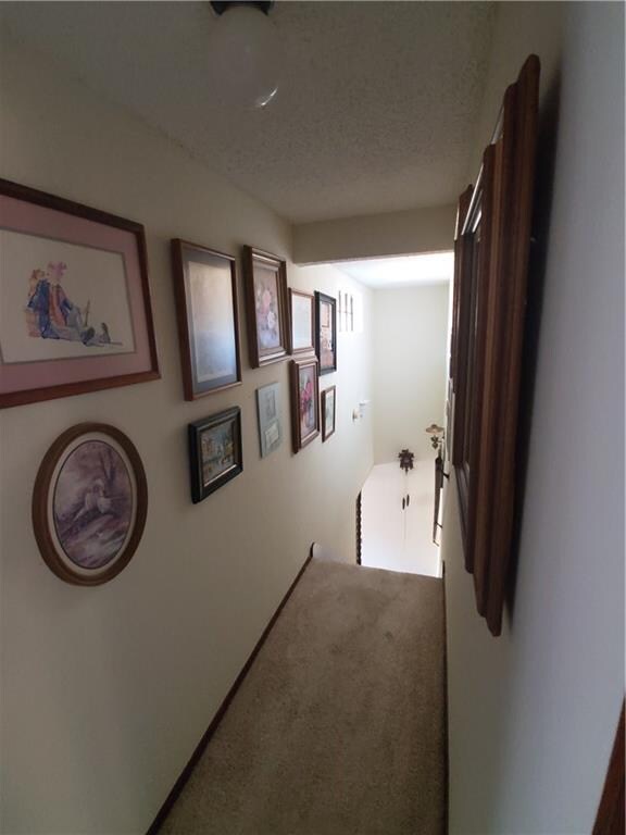stair hallway leading to master bedrooms