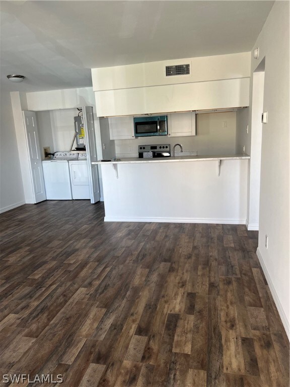 View of kitchen from living room