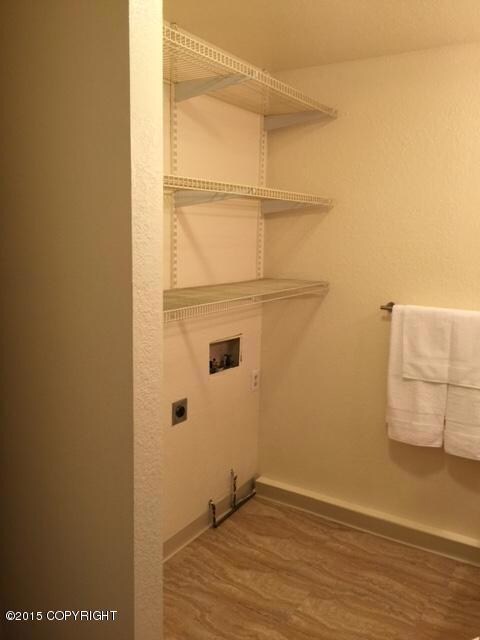 Bridgeway laundry hookup area in half ba