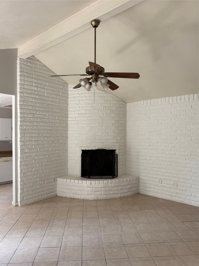 View of fireplace in the living room
