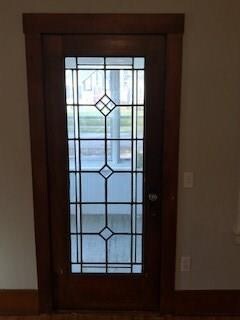 Lead glass original front door leading to enclosed