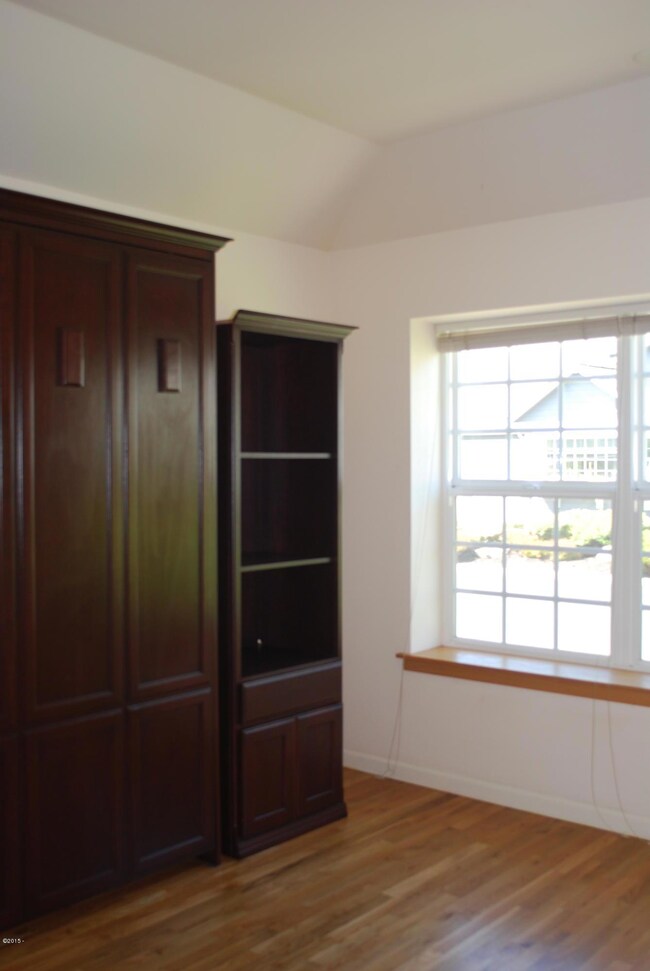 Bedroom 1 w Murphy Bed and TV