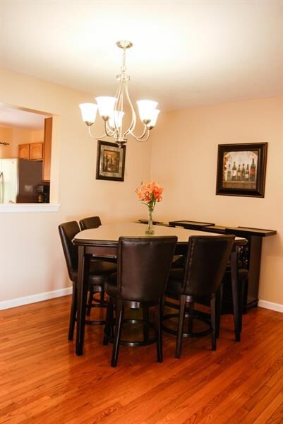 Nice size dining area with updated light fixture