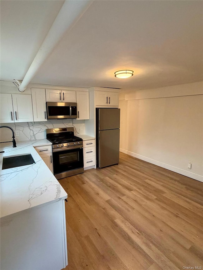 54 S Kensico Ave unit BSMT, White Plains, NY 10601 - photo 2