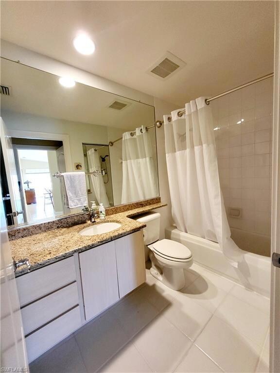 Full bath with visible vents, toilet, vanity, show