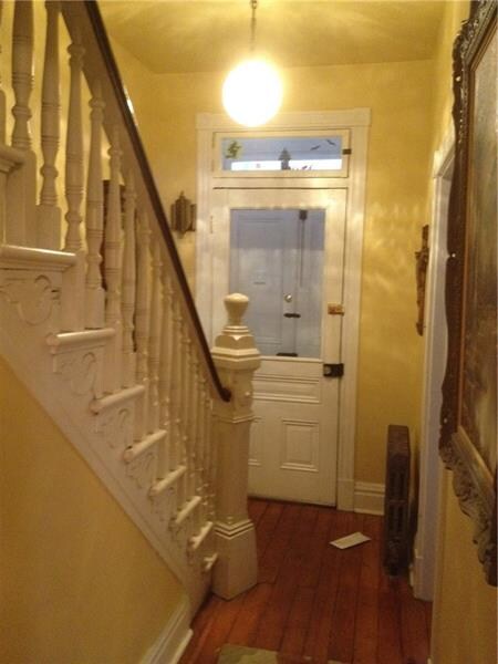 This view of the front entry and the side of the s