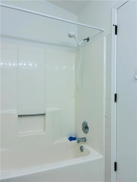 Bathroom with shower / bath combination