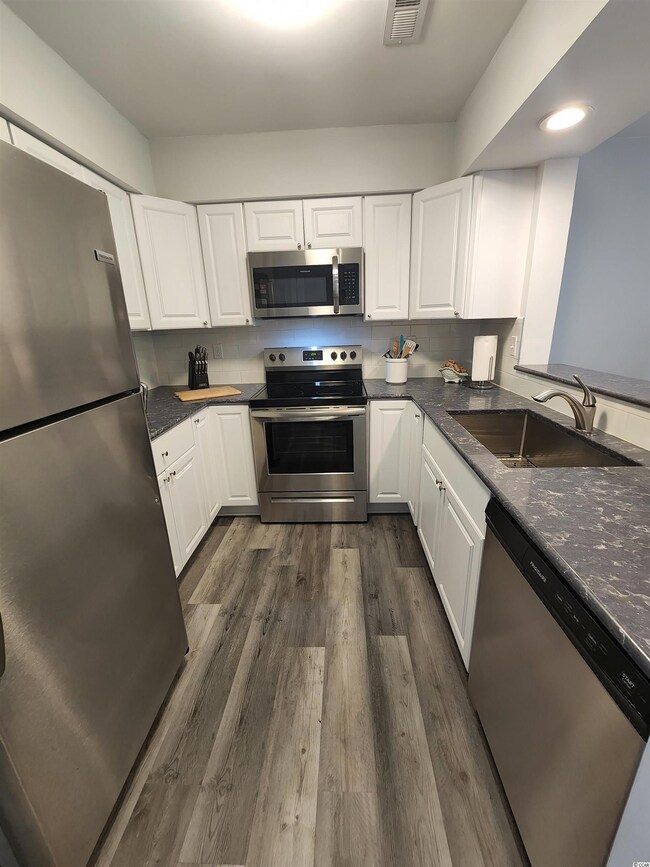 New Cabinets, Quartz Counter Tops, Stainless Appli